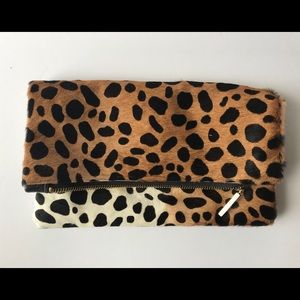Calf hair fold over Mari Clutch